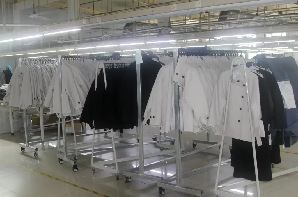 Finished garments on factory racks